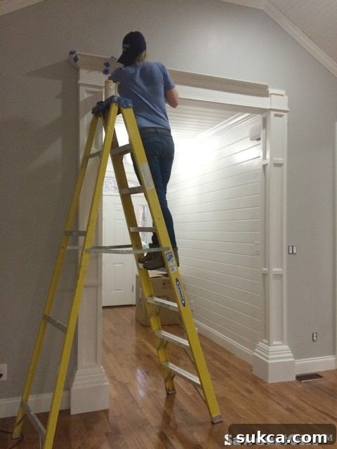 Primed and painted decorative columns in a doorway