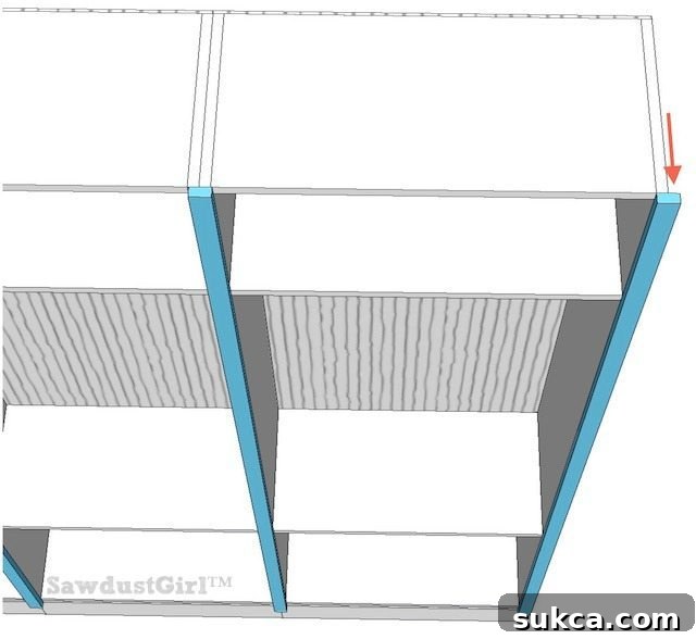Library wall to wall bookcases - free and easy plans from https://sawdustgirl.com.