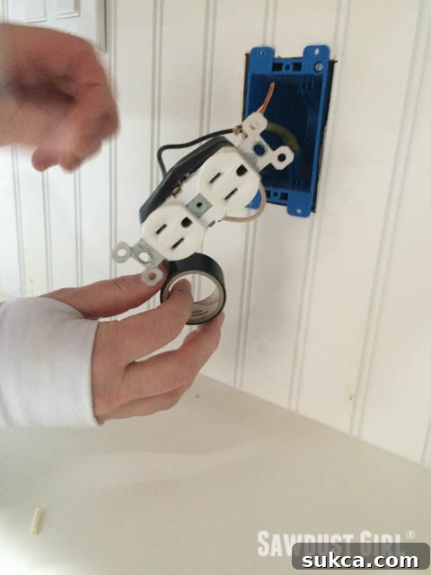 Insulating Outlet Wires with Tape Wiring an outlet: Taping connections