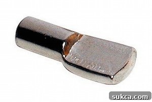A collection of 1/4-inch shelf pins for adjustable shelving
