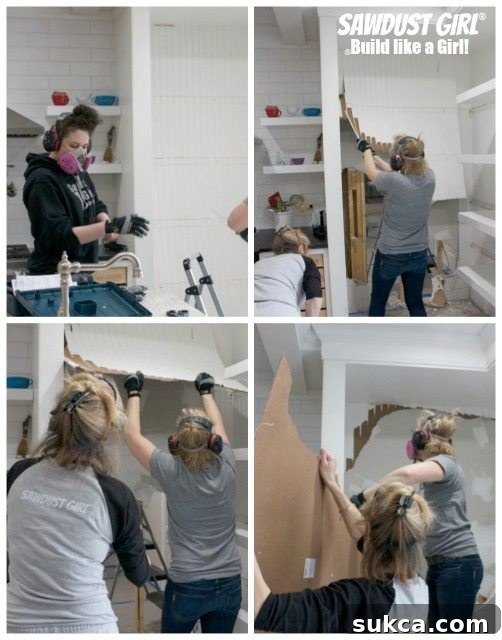 A determined demolition crew working together, meticulously tearing down structures to pave the way for a brand-new home design.