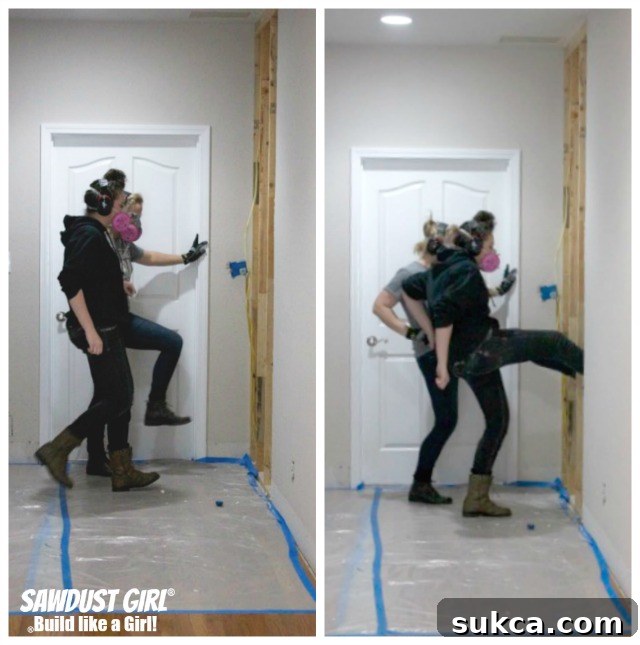 Enthusiastic home demolition continues as old drywall is kicked out, making significant progress towards opening up and transforming the space.