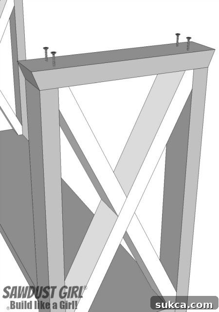 Securing the X-braces to the console table legs with screws and brad nails