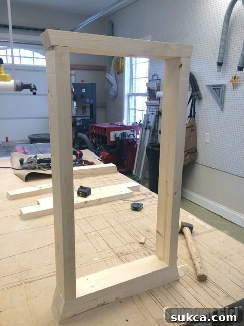 Dry fitting the legs of a wood console table before final assembly