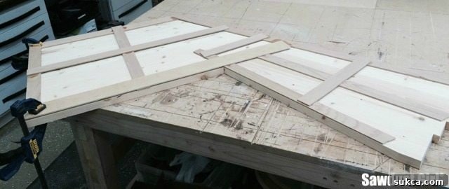 Detail of a precisely cut mitered corner on a wood countertop section.
