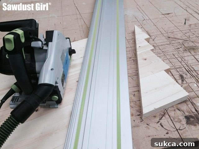 Using a track saw to make a precise, straight cut on the assembled wood countertop.