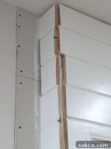 Uneven ends on a plank wall requiring trimming