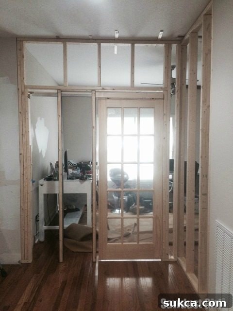 Close-up of the installed pocket door, showcasing its smooth operation.