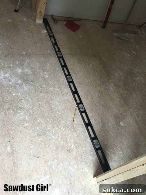 Marking Floor Line for Pocket Door How to install a pocket door frame ~ https://sawdustgirl.com