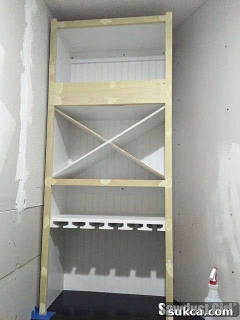 Prepping Faceframe for Paint Sanding and patching the wine cabinet faceframe