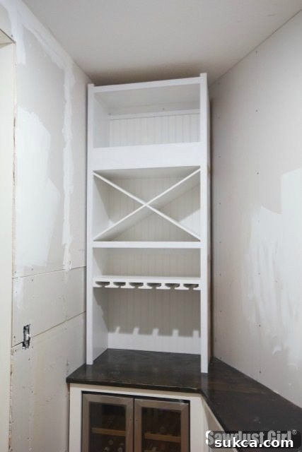 Finished Wine Cabinet Painting Primed and painted wine storage cabinet