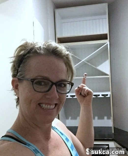 Installed Built-In Wine Cabinet Custom wine storage cabinet fully installed in pantry