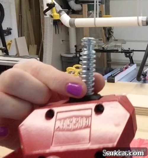 Close-up of the wide thread on a Bessey Angle Clamp for quick adjustment.