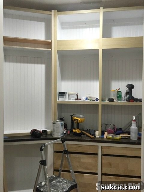 Wide stock being glued up for the ladder rail, showing clamps holding the pieces together during the curing process.