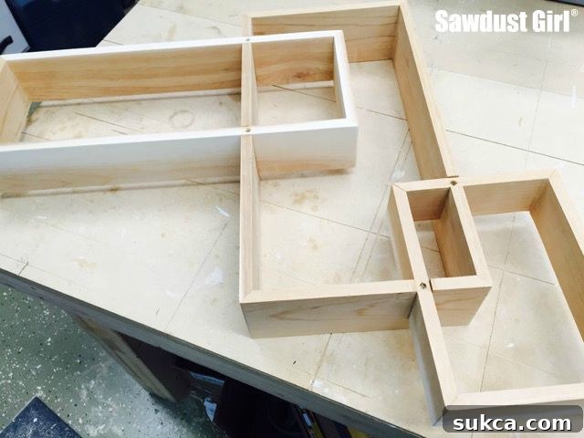 Reinforcing the three tiered display shelf with screws