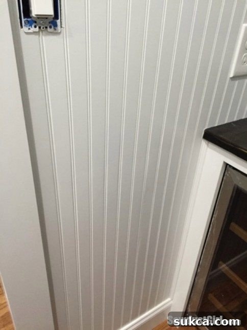 Step-by-step guide to concealing beadboard panel joints.