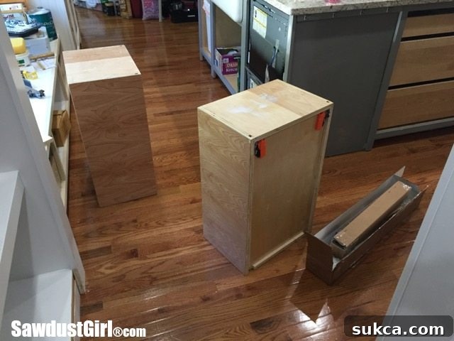 Large, heavy-duty drawers built from 3/4-inch plywood, intended for bulk storage