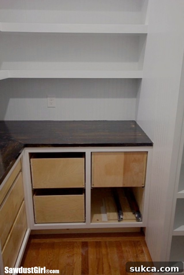 Broken heavy-duty Blum drawer runner, highlighting the hardware setback