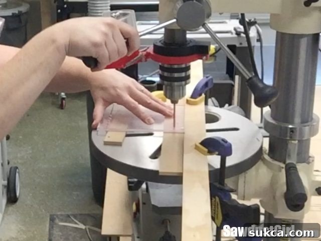 Precision drilling for custom hardware template Drilling holes in the plexiglass template with a drill press