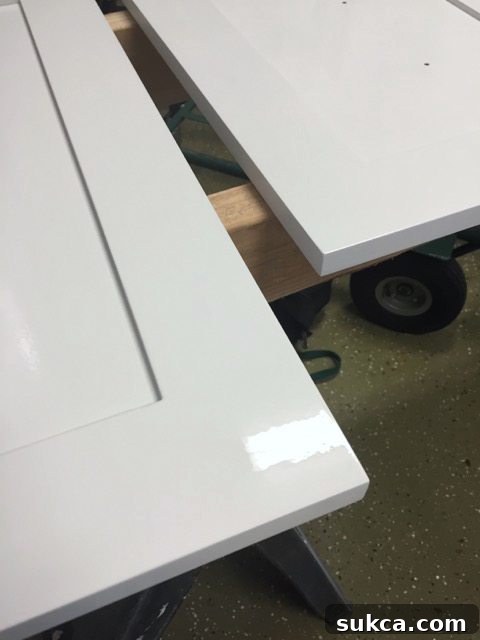 Finished Cabinet Doors Finished painted cabinet doors, beautifully smooth and ready for installation, showcasing a successful DIY project