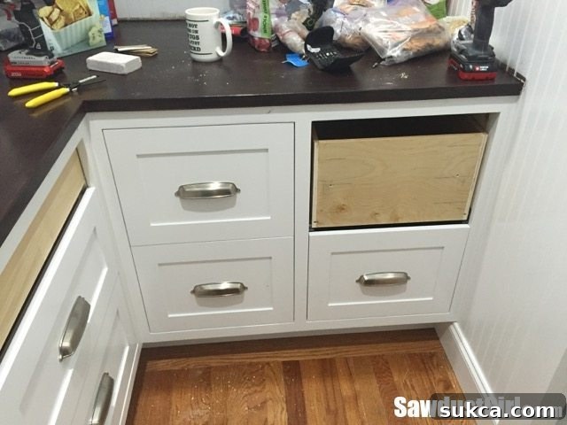 Adjusting drawer fronts for perfect alignment, even after initial installation