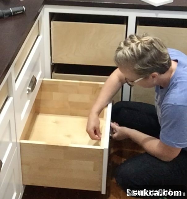 The iterative process of fine-tuning drawer front alignment