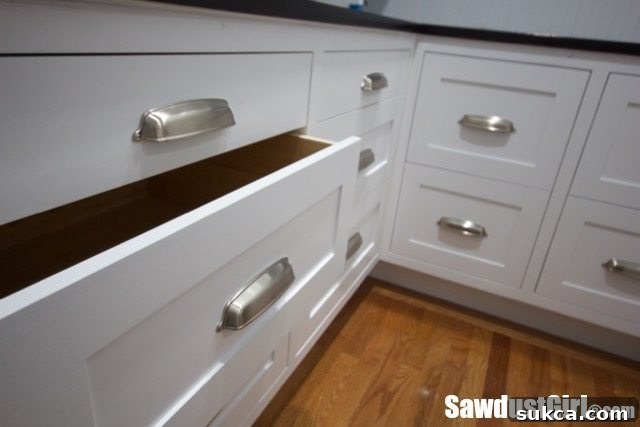 Step-by-step guide on how to install and align drawer fronts on cabinets