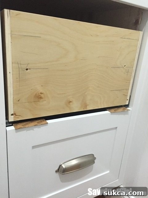Ensuring holes align with sturdy parts of a five-piece drawer front