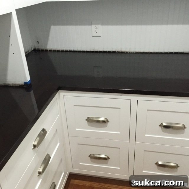 Staining wood countertops - Sanding between poly coats