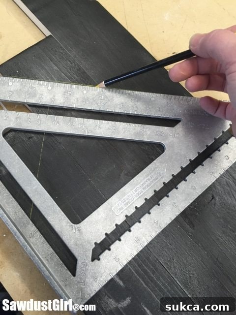 Marking Arrowhead Cuts Marking the arrowhead angles on the assembled pallet wood