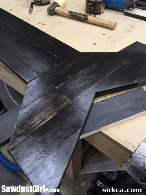Black Wash on Pallet Wood Project Applying a light black stain coat over the custom gel stained wood arrow