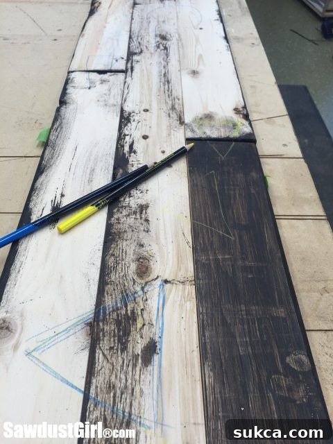 Chalk Marking for Pallet Arrow Marking pallet wood planks with chalk for reassembly and pocket holes