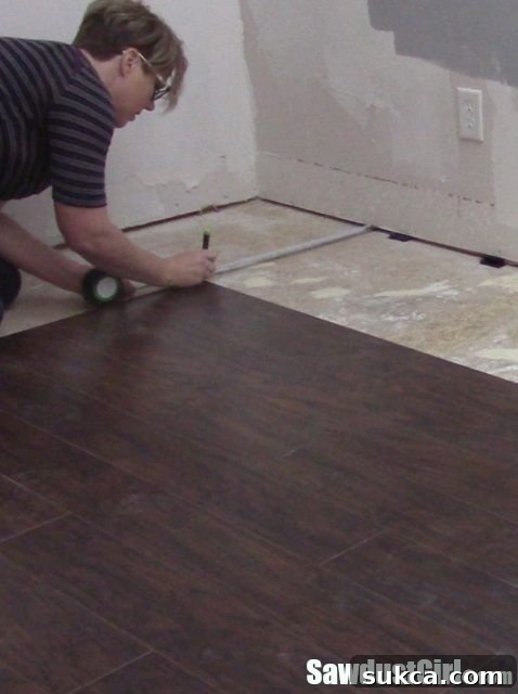 Planning laminate flooring installation around future cabinets