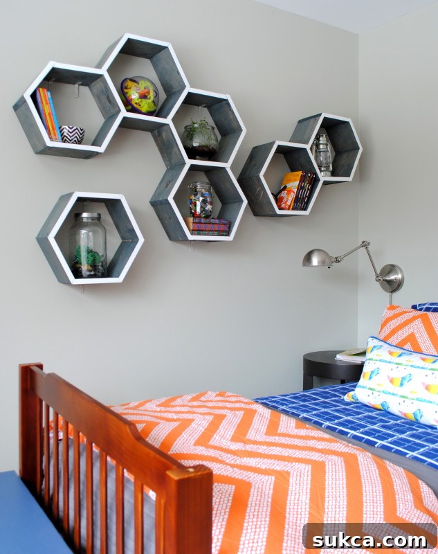 Fantastic DIY honeycomb shelves showcasing a beautiful contrast of white and weathered grey.