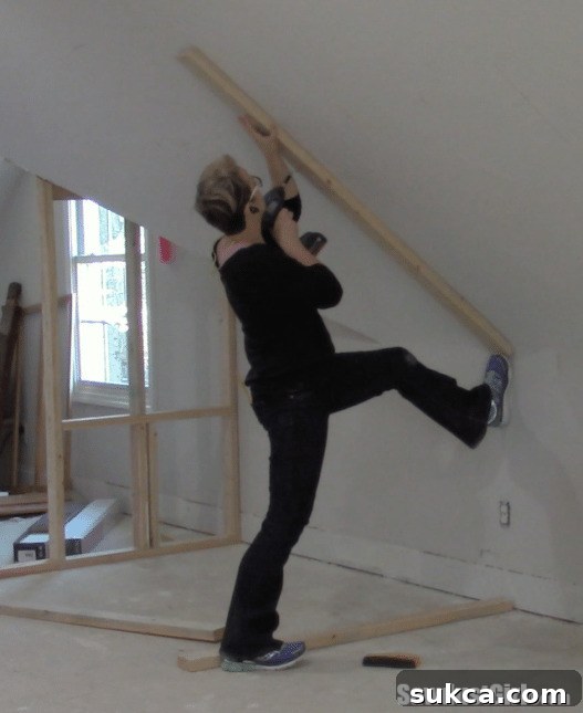Framing a closet around wonky angled ceilings - Securing the first vertical stud to the angled ceiling
