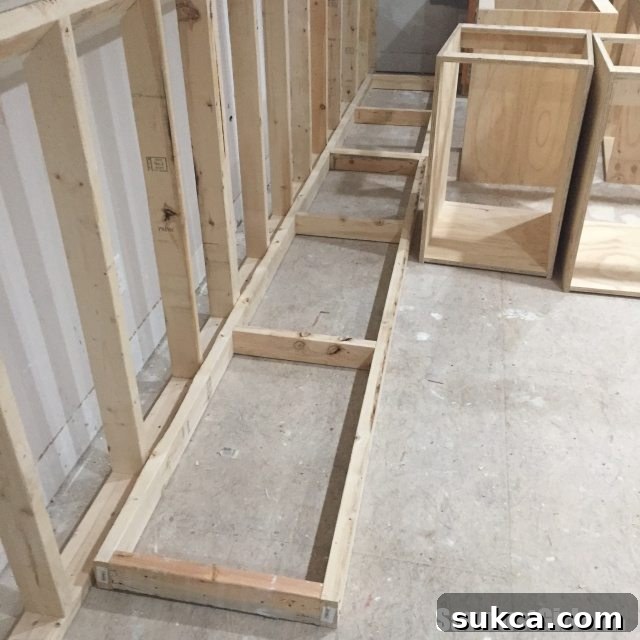 Cabinet Base Construction Construction of the plywood base to elevate cabinets and create a toe-kick space