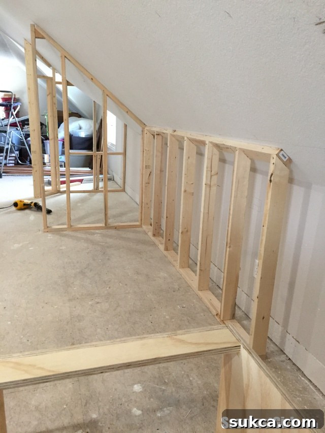 False Wall Section Installed First section of the false wall successfully tilted up and secured in the craft room