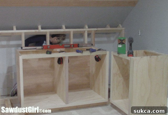 Considering potential uses for the 'lost' space behind the cabinets