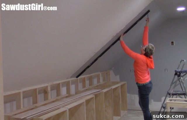 Slow progress on ceiling installation Close-up of partially installed plywood ceiling planks