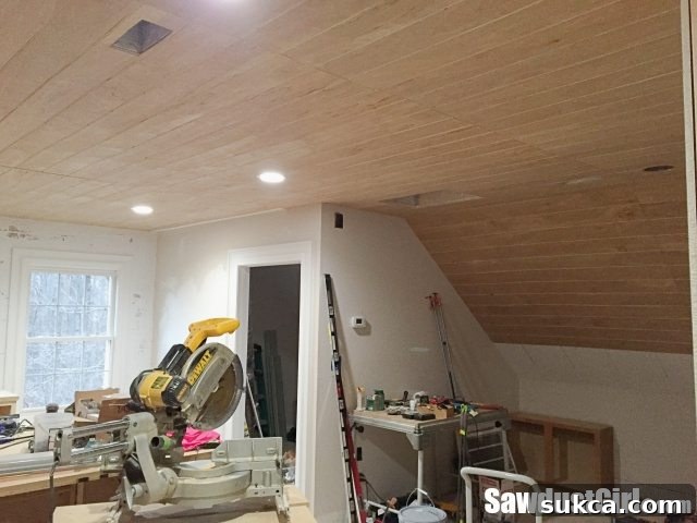 Primed ceiling planks Plywood ceiling after nail holes filled and primed