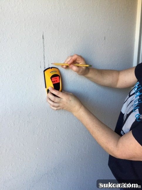Marking joists on textured ceiling Marking ceiling joist locations with a marker