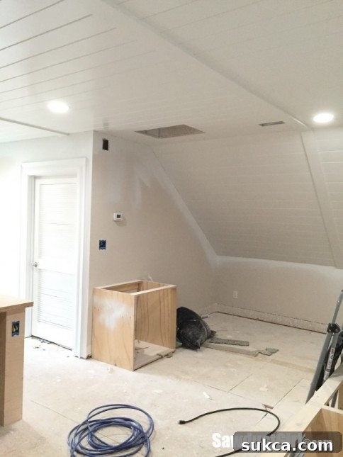 Relocating thermostat and light switch during studio renovation