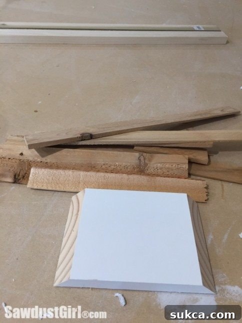 Detailed view of tools and materials prepared for under-cabinet filler installation