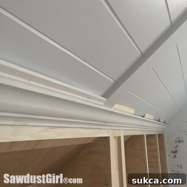 Second layer of molding being installed