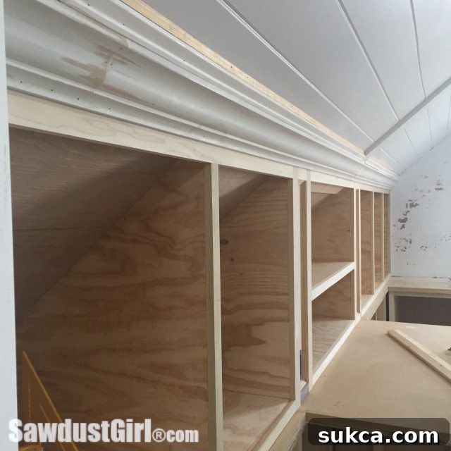 Third layer of glass bead molding being installed along the ceiling