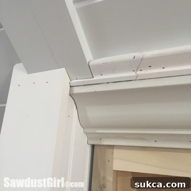 Before and after of molding seams, showing putty and caulk application