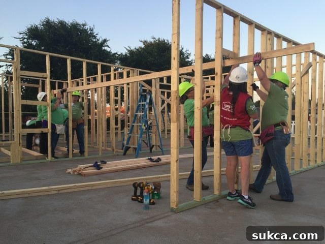 Dedicated volunteers continuing to build as dusk settles