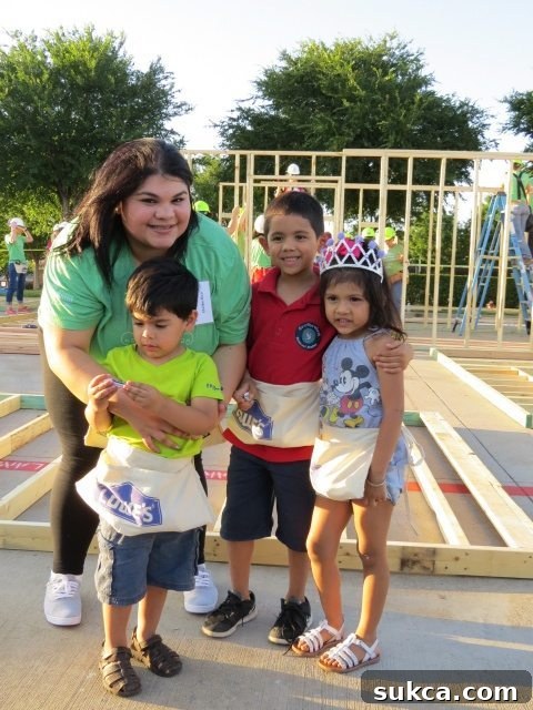 Women Build volunteers working together to raise walls