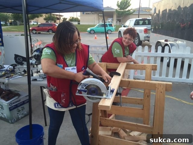 Women learning to use power tools at a Lowe's Habitat for Humanity event