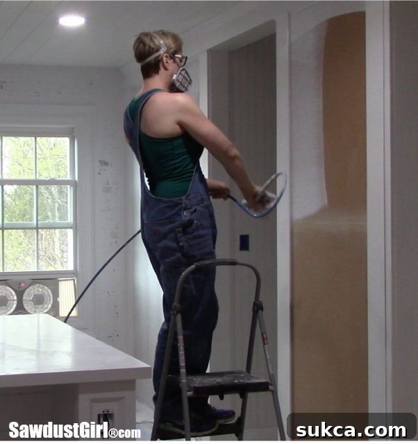 Applying Primer to Cork Wall